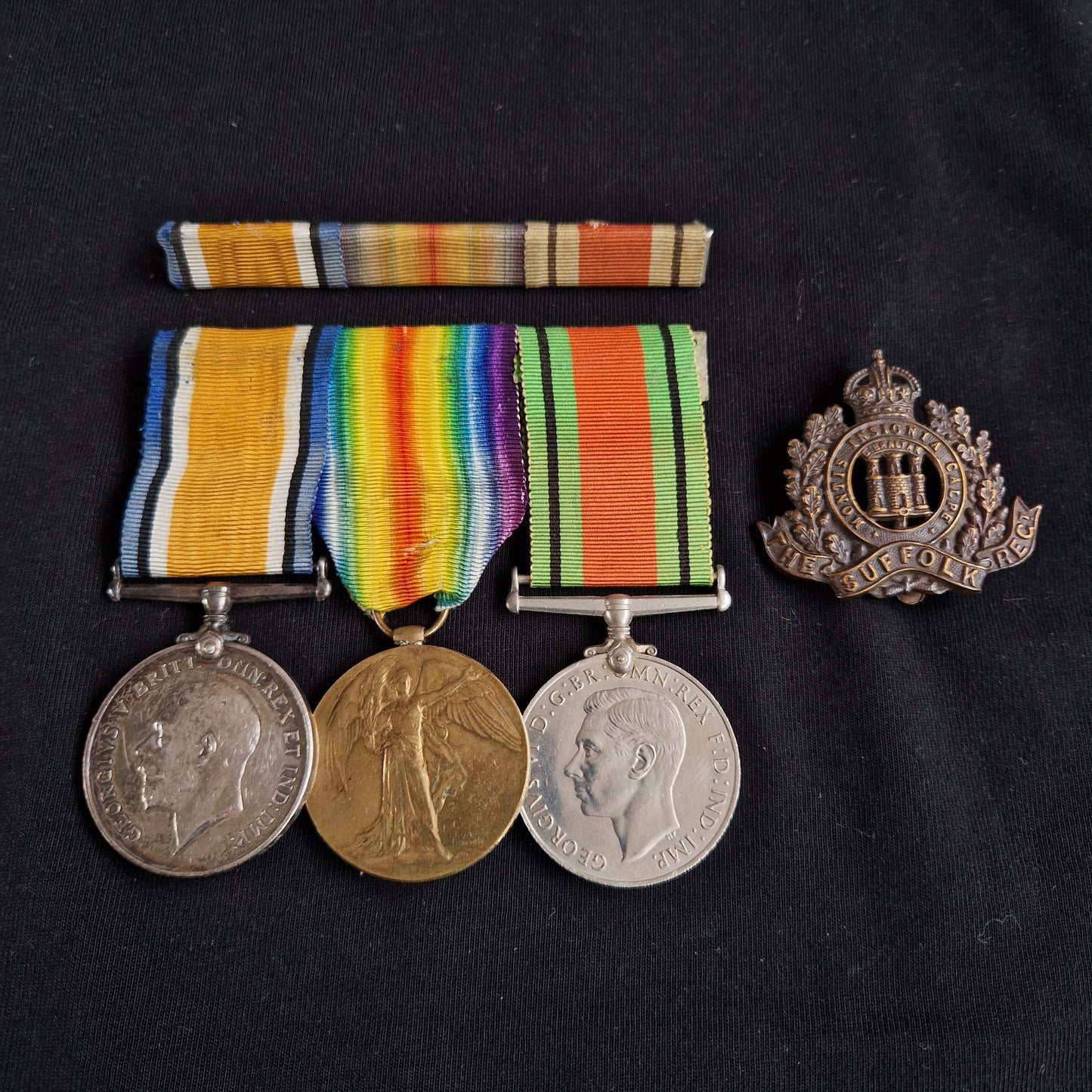 Suffolk Regiment WW1 Medal Pair WW2 Defence Medal Cap Badge Brundish Suffolk
